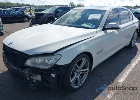 2014 BMW Alpina B7 из США, поврежденный, VIN WBAYE8C52ED135312